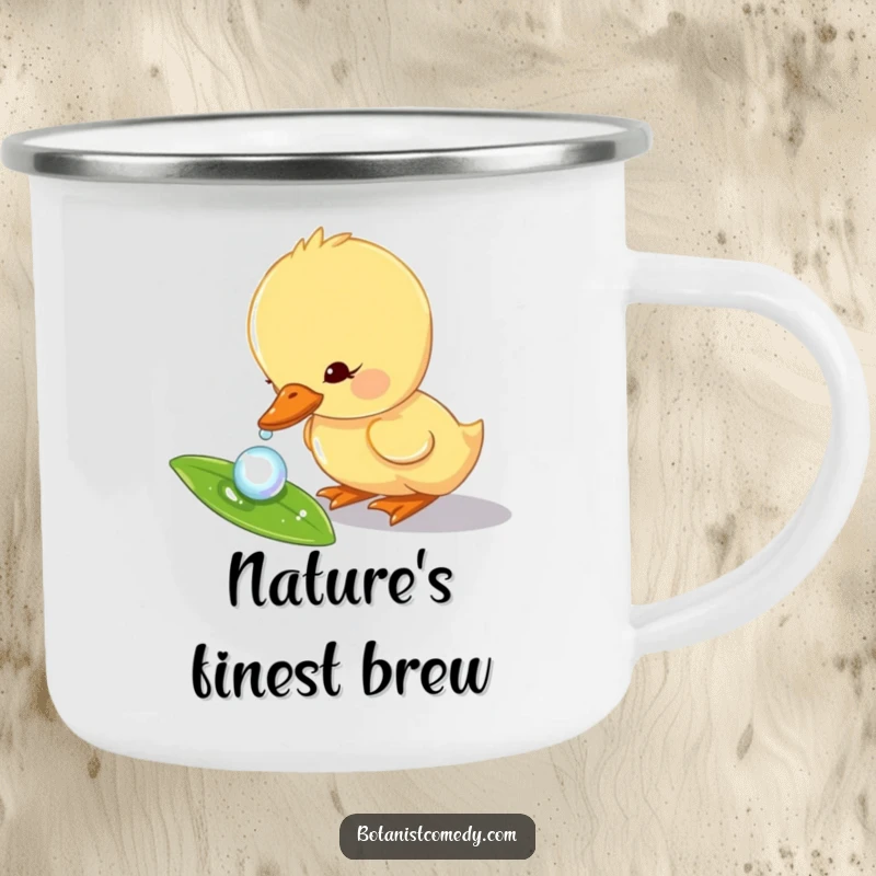Funny duckling camping mug showing a curious duckling character dipping its beak into a dewdrop, perfect for adventures.