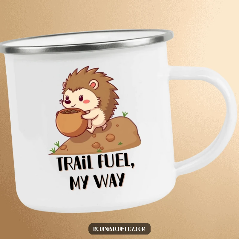 Funny hedgehog camping mug showing a determined hedgehog pushing a large seedpot uphill, ready for outdoor endeavors.